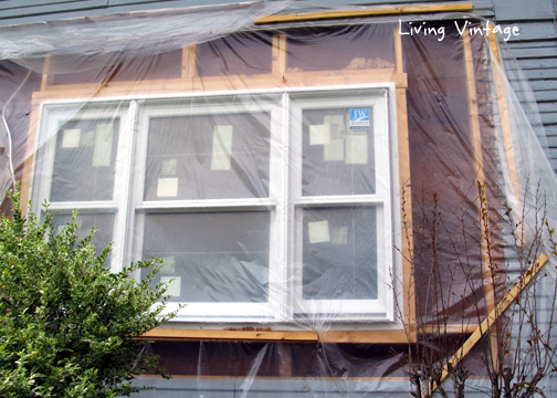 kitchen windows replaced and exposed walls protected with plastic