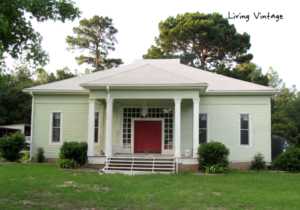 the front of our house with new paint on the siding and trim